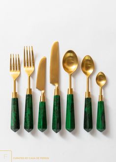 six gold and green utensils are lined up next to each other on the instagram page