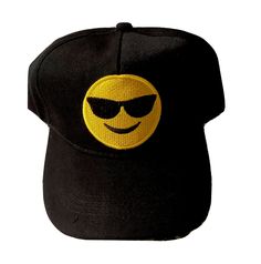 The perfect hat for never frowning and always smiling.  Wear your emotions on your head with this Smile With Sunglasses Emoji-inspired baseball cap. This Smile with Sunglasses Emoji Baseball Cap is made of high quality material that is perfect for gift to yourself and many others. It features a front embroidered design and adjustable strap. The Smile Emoji Baseball Cap is built for comfort and style, with a snapback for adjustment of size. It's the perfect accessory to let the world know how you Adjustable Baseball Cap With Smiley Face, Funny Black Snapback Baseball Cap, Playful Black Baseball Cap With Curved Brim, Trendy Baseball Cap With Uv Protection, Fun Black Visor Hat, Adjustable Smiley Face Fun Baseball Cap, Playful Black Snapback Baseball Cap, Fun Baseball Cap With Uv Protection, Fun Uv Protection Baseball Cap