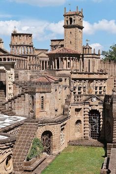 an old castle like building with many windows