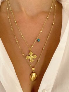 A gold cross necklace and a unique disc necklace from steell that opens and you can put inside a photo that you want. You can wear them together or separetely. In Christina Christi Jewels store you can see more than 50 designs in Women's Necklaces. You can have them in 2-4 Days with DHL EXPRESS SHIPPING MATERIALS - Gold filled Chains that are made from Steel. - Metal Cross. - Photo Charm is made from Steel. - In all necklaces I use extension at the joined edges for perfect fit. DIMENSIONS - Cros Rustic Gold Cross Necklace, Gold Cross Locket Necklace, Cross Photo, Necklace Photo, Picture Necklace, Brown Leather Backpack, Necklace Cross, Metal Cross, Gold Cross Necklace