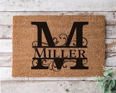 a door mat with the letter m on it