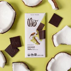 a bar of chocolate surrounded by coconuts on a yellow background with the word thoo printed on it