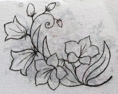 a black and white drawing of flowers on a wall