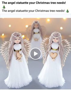 two angel figurines are shown with lights in the backgroung behind them