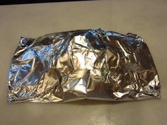 an aluminum foil bag sitting on top of a table