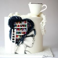 a coffee cup with a book shelf on it and a woman's face painted on the side