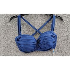 Bleu Rod Beattie Shirred Underwire D-Cup Bikini Top Women'S 34d Navy Hook Back Bleu Rod Beattie Shirred Underwire D-Cup Bikini Top Women's 34d Navy Hook Back Retail $79.00 Look Fabulous In This Bleu Rod Beattie Shirred Underwire Swim Top With Wide Straps. The Solid Navy Color Complements Any Beach Theme, While The Adjustable Strap Makes It Easy To Find The Perfect Fit. It's A One-Piece Bikini Top Made With Nylon And Spandex Materials That Provide Comfort And Durability. This Item Is Hand Wa Spring Tankini With Built-in Bra And Underwire, Strapless Nylon Swimwear For Party, Underwire Tankini With Straps, Strappy Swimwear With Built-in Bra, Fitted Nylon Bra For Summer, Summer Nylon Bra, Underwire Tankini With Straps For Pool, Underwire Stretch Tankini With Straps, Strapless Padded Fitted Swimwear