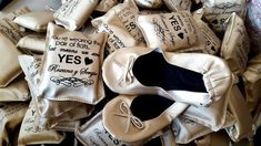 a pile of wedding shoes that say yes and no one is going to be married