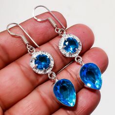 PRODUCT DESCRIPTION: Price: 1 Pieces Quality: AAA Fine Quality  Handmade Jewelry Earring  Blue Topaz  Blue Topaz Earring  Lab-Created Blue Gemstone Crystal Earrings, Blue Round Crystal Earrings For Anniversary, Mom Love, Handmade Jewelry Earrings, Blue Topaz Gemstone, Earring Gift, Jewelry Earring, Swiss Blue Topaz, Topaz Gemstone