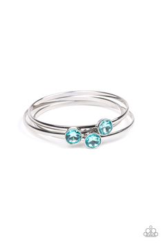 Encased in sleek silver frames, dazzling blue gems sit atop thick silver bangles for a refined flair.

Sold as one set of three bracelets. Bangle Bracelet Set, Silver Frames, Paparazzi Accessories, Blue Gems, Silver Bangle Bracelets, Paparazzi Jewelry, Bracelet Collection, All You Can, Blue Rhinestones