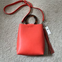 Nwt Crossbody Bag. Coral Color With Turtle Handles. Very Cute! Spring Shopping Hobo Crossbody Bag, Spring Shopping Crossbody Hobo Bag, Spring Crossbody Hobo Bag With Detachable Strap, Summer Crossbody Hobo Bag For On-the-go, Spring Crossbody Bag With Detachable Strap, Spring Hobo Bag With Adjustable Strap For Shopping, Spring Adjustable Strap Hobo Bag For Shopping, Spring Crossbody Bucket Bag For On-the-go, Spring Crossbody Hobo Bag With Detachable Handle