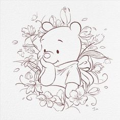 a drawing of a teddy bear surrounded by flowers