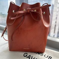 Good Condition And Perfect Bag For Fall, Summer, Spring! Leather Has Some Marks And Scratches As Shown In Photos. Comes With Original Dust Bag. Height: 10.5”. Width: 7.5” Mansur Gavriel Bucket Bag, Mansur Gavriel Bag, Mansur Gavriel, Perfect Bag, Bucket Bag, Shoulder Bags, Dust Bag, Bag Lady, Shoulder Bag