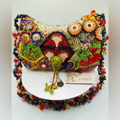 Vintage Mary Frances Beaded Shoulder Bag. Can Hold A Phone, Keys, Cards And Some Other Mini Cosmetics. In Great Condition Besides Some Very Minor Missing Beads/ Loose Ribbon Shown In Last 3 Pics. The Bag Still Looks Gorgeous As A Whole Piece And Deserves Great Love! Gift Embellished Multicolor Shoulder Bag, Embellished Multicolor Bags As Fashion Accessory, Unique Beaded Bags For Everyday Use, Mary Frances Handbags Retired, Embellished Multicolor Shoulder Bag, Mary Frances Black Green Orange Handbag, Embellished Multicolor Pouch Shoulder Bag, Unique Beaded Everyday Bags, Beaded Multicolor Embroidered Rectangular Shoulder Bag