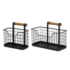 two black metal baskets with wooden handles