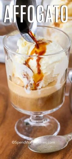 an ice cream sundae is being drizzled with caramel sauce