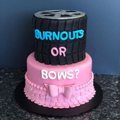 a three tiered cake with the words burnouts or bows? on it's side