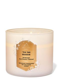 this is an image of a candle that says tis the season