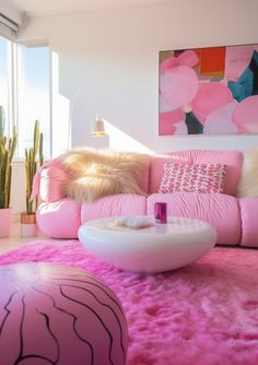 a living room filled with furniture and pink rugs