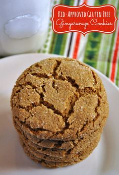 a stack of cookies sitting on top of a white plate