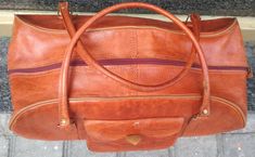 "Welcome! Amazing Leather Bag In Very good condition. Only small signs of use and small stain in the base of bag! One compartment outside Dimensions: - Tall: 10.23\" (26 cm) - Deep: 10.23\" (26 cm) - W: 19.29\" (49 cm) - Handles: 23.62\" (60 cm) Thanks for stopping by!!IMPORTANT: Due to the delicate situation We're all going through, and in order to keep the safety of courier workers too, all orders will be dispatched when alert sanitary finished. You can purchased or reserve items like always. Travel Satchel With Leather Lining In Camel, Camel Satchel With Leather Lining For Travel, Camel Travel Bag With Leather Lining, Travel Bag With Leather Lining In Camel Color, Rectangular Camel Business Bag, Rectangular Cognac Weekender Bag, Travel Satchel In Soft Camel Leather, Camel Leather Bag, Market Basket Bag