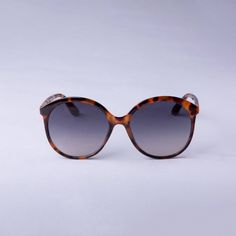 Give your sunny-day style a polished update with these Oversized Round Tortoise Shell Sunglasses from A New Day™. In an oversized round shape, these sunglasses sport multicolored lenses for a cool look that's beautifully complemented by the brown tortoiseshell frame. The plastic frame sits comfortably on your face while UV protection helps keep your eyes safe from the sun, making these glasses an instant go-to option. A New Day™: Style that goes wherever you do. Tortoiseshell Sunglasses With Tinted Lenses And Round Frame, Tortoiseshell Round Frame Sunglasses With Tinted Lenses, Tortoiseshell Sunglasses With Tinted Round Frame, Tortoiseshell Sunglasses With Tinted Round Lenses, Casual Aviator Sunglasses With Gradient Round Frame, Brown Round Sunglasses For Beach, Casual Round Polarized Sunglasses, Casual Brown Round Sunglasses, Casual Tortoiseshell Sunglasses With Gradient Lenses