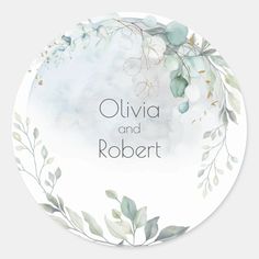 a white plate with green leaves and the words, olvia and robert on it