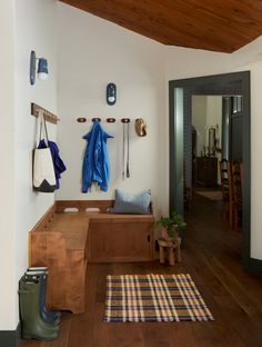 the entryway is clean and ready to be used as a mudroom or office