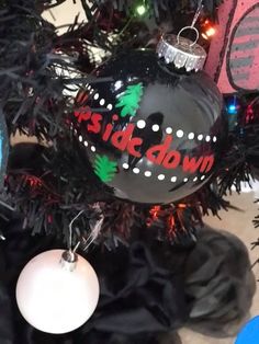 a close up of a christmas tree with ornaments on it and the words ride down