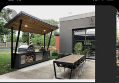 an outdoor bbq with tables and chairs next to it