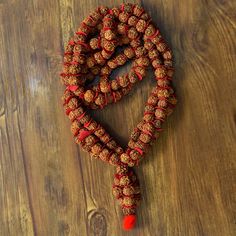 📿This divine 5 Mukhi Rudraksha Kantha Mala helps an individual to get closer to the divine and connects him to the inner Guru (consciousness). The Kanthas hold the divine vibrations of the ruling deity and the positive energy is circulated through each Rudraksha bead which reaches the Sumeru bead and from there it is passed on to the body of the person wearing it.📿 📿Wearing this Rudraksha Kantha Mala removes anomalies of human nature like Kama (Lust), Lobha (Greed), Moha (Attachment), and Kro Traditional Necklaces With 8mm Beads For Rituals, Handmade Spiritual Mala For Puja, Traditional Handmade Mala For Meditation, Bohemian Beaded Necklace With 108 Beads For Puja, 108 Beads For Festivals, Traditional Mala With 108 Beads For Festival, Bohemian Mala With Round Beads For Festivals, Spiritual Beaded Necklaces For Festive Occasions, Hand-strung Spiritual Mala For Puja