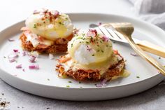 two food items on a plate with a fork