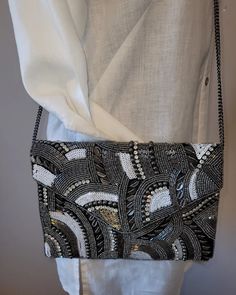 * Seed Bead* Cotton* Shoulder Chain Bag can be worn as a crossbody. Chic Beaded Crossbody Shoulder Bag, Beaded Crossbody Shoulder Bag For Evening, Beaded Shoulder Bag Clutch, Beaded Crossbody Clutch, Party Beaded Crossbody Shoulder Bag, Beaded Crossbody Shoulder Bag For Party, Party Crossbody Bag With Beaded Details, Beaded Crossbody Evening Bag For Party, Beaded Crossbody Clutch For Party