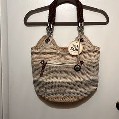 Questions? Leave A Comment Below! I Got This Bag A Few Years Back And Just Never Used It. Tag Still Attached. Has One Outside Zip Pocket, One Small Outside Open Pocket, Large Inside Zip Pocket And Two Open Inside Pockets. Has Top Zipper Closure. Colors Are Different Variations Of Tan And Some Gray Stripes. Casual Cream Crochet Bag, Casual Cream Crochet Bag With Handles, Casual Everyday Neutral Crochet Bag, Crochet Beige Hobo Bag For Travel, Beige Crochet Hobo Bag For Travel, Beige Crochet Hobo Bag, Beige Crochet Hobo Bag For Everyday, Everyday Neutral Crochet Shoulder Bag, Crochet Shoulder Bag In Neutral Color For Everyday Use