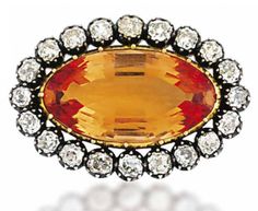 A 19TH CENTURY TOPAZ AND DIAMOND BROOCH  Of oval outline, the navette shaped… Sterling Silver Wedding Band, Imperial Topaz, Vintage Fine Jewelry, Circle Diamond, Brooch Jewelry, Unique Diamonds, Spinner Rings