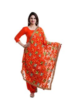 Elevate your wardrobe with our exquisite Phulkari Embroidery dupatta. Made from delicate chiffon silk, this timeless accessory boasts beautiful, multicolored phulkari embroidery that adds a touch of luxury to any outfit. Perfect for pairing with a salwar suit, lehenga, or dress, it is both stylish and practical. ​Fabric: Semi Chiffon Silk Condition: New Machine work phulkari embroidery Gold border lace Pattern: Geometric Large 2.3x1 meter Care: Soft Wash Dispatched in 1-3 business days Multicolor Georgette Anarkali Set With Zari Work, Multicolor Anarkali Dupatta With Mirror Work, Orange Chanderi Traditional Wear With Mirror Work, Multicolor Georgette Salwar Kameez For Navratri, Navratri Multicolor Georgette Salwar Kameez, Red Churidar With Sheer Dupatta In Chinon, Red Georgette Salwar Kameez With Dupatta, Multicolor Resham Embroidery Dupatta In Chinon, Traditional Anarkali Set With Multicolor Embroidery And Sheer Dupatta