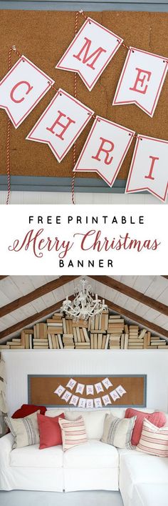 a christmas banner is hanging on the wall next to a white couch and fireplace with red pillows