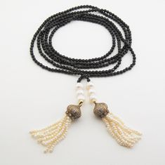 this necklace, was made with beautiful baroq pearls and black onyx, natural stone Total Length 64.5. inç. ( 163 cm. ) U.S. fast shipping by ups 2-3 days sending requests and suggestions, please feel free to convo me product in a box with a gift bag will be sent to For other inquiries, please visit the shop policies Thank you for visiting our shop http://www.etsy.com/shop/SevimsDesign İnstagram :sevimsdesign Elegant Black Jewelry With 108 Beads, Elegant Black Beads Lariat Jewelry, Elegant Adjustable Lariat Necklace With Gemstone Beads, Elegant Black Beaded Lariat Jewelry, Elegant Adjustable Long Necklace With Natural Stones, Elegant Adjustable Pearl Necklace With Gemstone Beads, Elegant Black Lariat Long Necklace, Elegant Long Necklace For Jewelry Making With Gemstone Beads, Elegant Long Necklace With Gemstone Beads For Jewelry Making