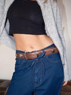 Emery Belt - Brown – Lisa Says Gah Grommet Belt, Lisa Says Gah, Belt Brown, Brown Leather Belt, The Hand, Silver Accents, Turks And Caicos Islands, Synthetic Leather, Trinidad And Tobago