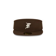 The Fear of God Essentials Walnut 59FIFTY Visor features an embroidered Fear of God logo at the front panels with the official MLB Batterman logo at the rear and a green undervisor. Collegiate Visor Fitted Hat For Streetwear, Brown Visor Hat For Streetwear, Classic Baseball Cap With Logo Patch, Brown Curved Brim Fitted Hat For Sports, Brown Fitted Hat With Flat Bill For Streetwear, Brown Flat Bill Fitted Hat For Streetwear, Brown Flat Brim Fitted Hat For Streetwear, Brown Curved Brim Fitted Hat For Streetwear, Fear Of God Logo