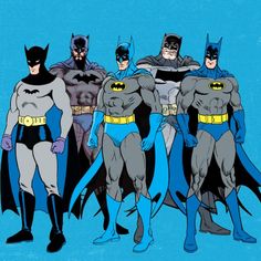 the batman family standing together in front of a blue background