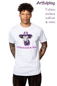 Not fitting in purple cow design to celebrate being unique. This beautiful purple cow with cowboy hat graphic is a creative unique design available on men tshirts, womans tshirts, childrens tshirts, sweaters, hoodies, stickers, phone cases, posters, other wall art and more in Artfulplays Redbubble pod shop. Other colors and fits available, like classic fit, slim fit, regular fit, V-neck, sleeveless shirts and hoodies. All sizes: S M L XL 2XL 3XL 4XL 5XL. Our model is wearing long fit 100% cotton tee. Get this tee with unique design to bring more love, positivity and equality to this world. 'Fitting in is not my thing’ defends equal rights for everyone including LGBTQIA+ people. Artfulplay strives to bring a little more equality, inclusiveness, tolerance, love and happiness to our world. Cow With Cowboy Hat, Cow Cowboy Hat, Cowboy Hat Illustration, Cowboy Hat Graphic, Hat Illustration, Hoodies Stickers, Purple Cow, Cow Design