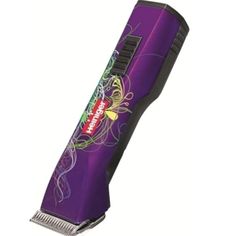 a purple and black hair clipper with floral designs on the front, sitting on a white background