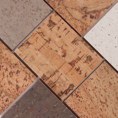 several different types of tile are arranged in the same pattern as they appear to be made out of wood