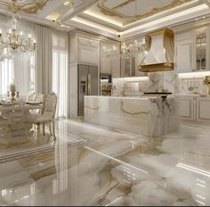 an elegant kitchen with white marble and gold accents