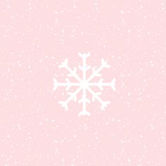 a snowflake on a pink background with white dots in the middle and bottom