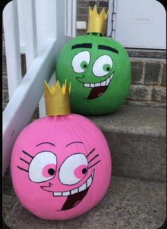 two pumpkins with faces painted to look like cartoon characters