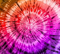 a tie - dyed background with many colors