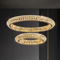 a modern chandelier hanging from the ceiling