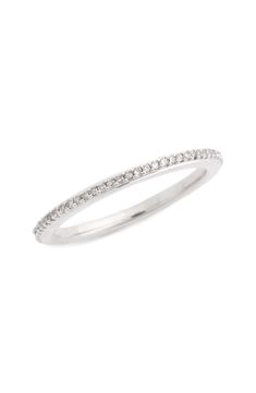 Designed for comfortable, everyday wear, this slender band is handcrafted from 18-karat-gold vermeil and illuminated with a fine line of pavé diamonds. The versatile piece makes a meaningful gift for a loved one or a lovely wedding band. Exclusive US retailer 1/8" band width Total diamond weight: 0.18ct. Sterling silver/18k-gold plate/white diamond, brown diamond, blue diamond or black diamond Imported >Diamond Guide This brand is certified with the with Butterfly Mark, which identifies luxury brands that adhere to social and environmental best practices This brand meets Nordstrom Responsible Brands criteria: brand adheres to responsible social and environmental practices Diamond Eternity Ring, Diamond Guide, Monica Vinader, Brown Diamond, Eternity Ring Diamond, Fine Line, Champagne Diamond, Diamond Eternity, Keep Jewelry